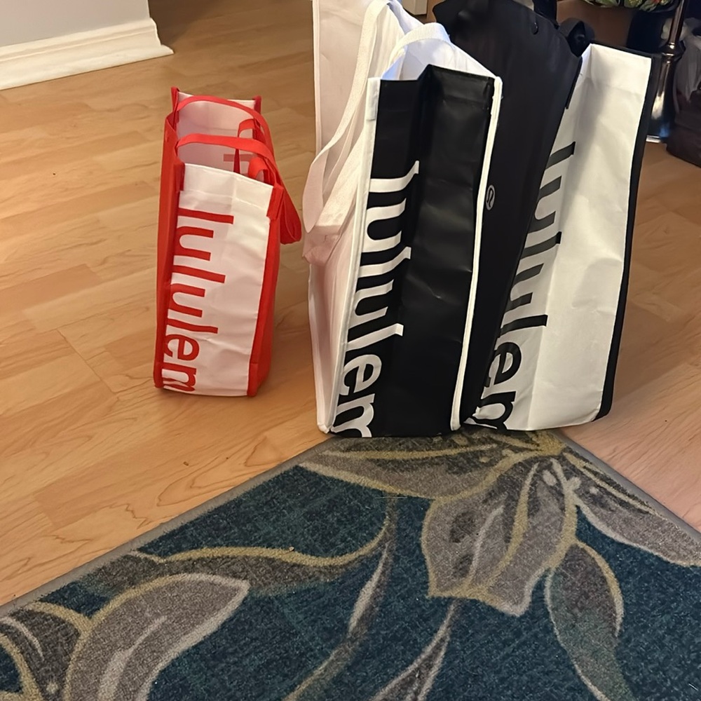 LuLuLemon shopping bags 2 large 1 small